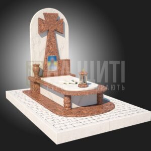 Пам'ятник для військового з червоного граніту та білого мармуру з високим хрестом.