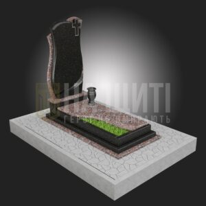Військовий пам'ятник з чорного граніту та червоного каменю з елегантним хрестом.