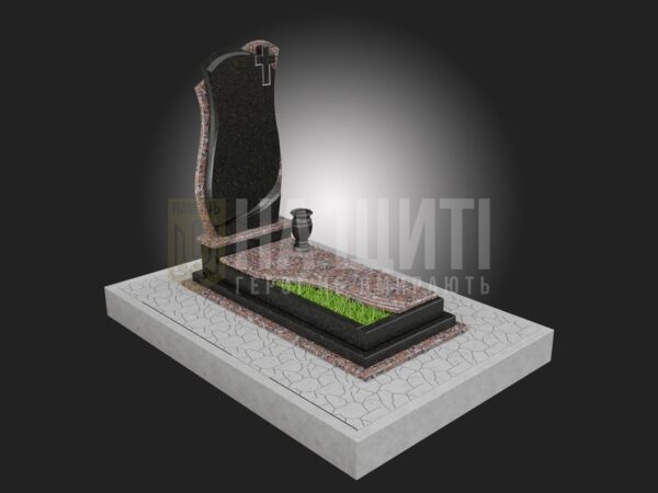 Військовий пам'ятник з чорного граніту та червоного каменю з елегантним хрестом.