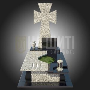 виконаний зі світло-сірого граніту